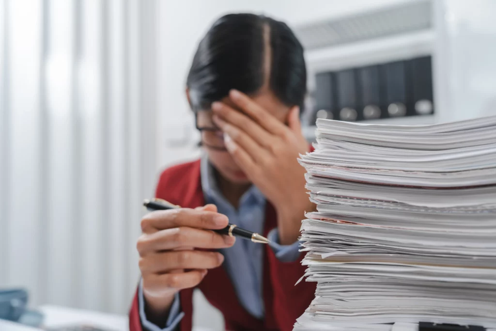 Employee overwhelmed by workplace documents after experiencing retaliation for protected activity in Orange County, California